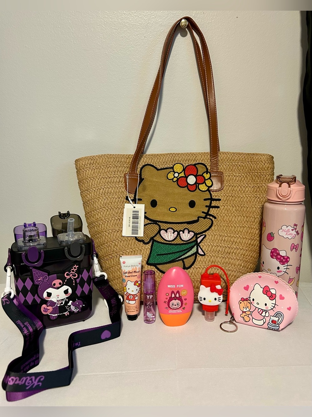 Hello Kitty Straw Tote Bag in Tan with Brown Handles and Colorful Graphic